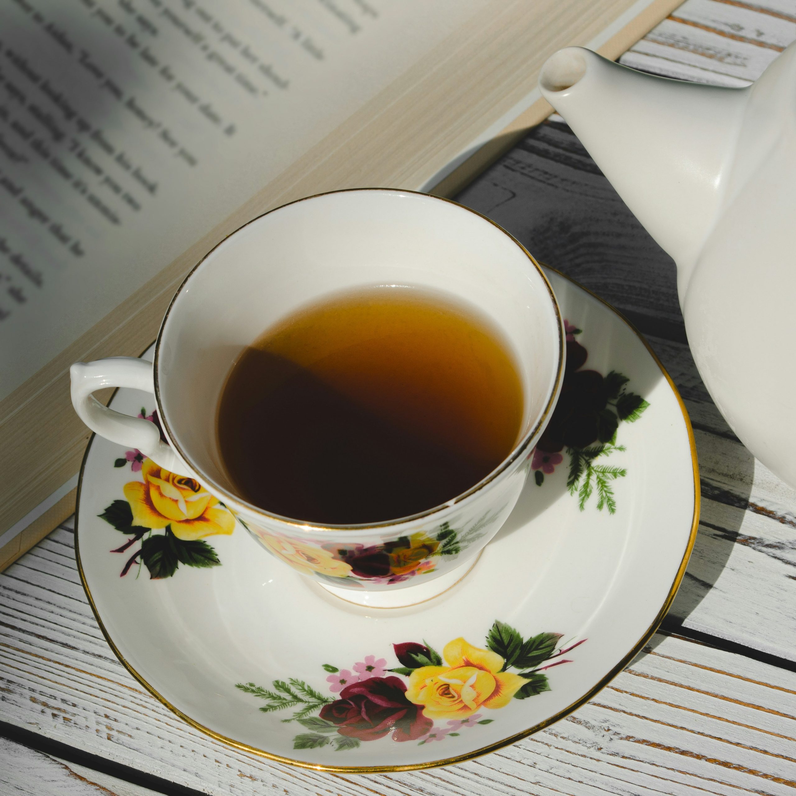 Teacup with yellow flowers